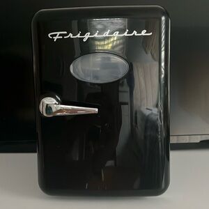 Black Frigidaire mini fridge.